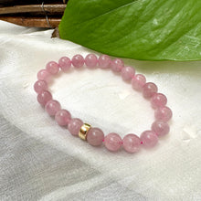 Load image into Gallery viewer, Rose Quartz Pearl Bracelet close-up on white cloth – gemstone and pearl detail