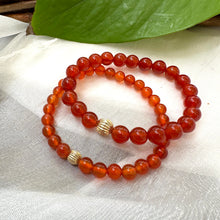 Load image into Gallery viewer, Orange Carnelian Bracelet stacked pair on white cloth – two-bracelet close-up