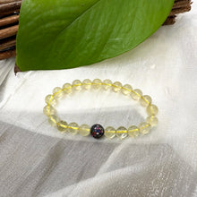 Load image into Gallery viewer, Lemon Quartz Bracelet displayed on white cloth – detailed product close-up