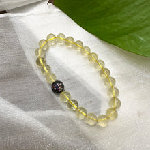 Load image into Gallery viewer, Lemon Quartz Bracelet on white cloth – bead and CZ accent detail shot
