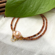 Load image into Gallery viewer, Hessonite garnet baroque pearl necklace featuring golden-pink baroque pearl and warm honey-orange hessonite.