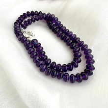 Charger l'image dans la galerie, Amethyst beaded necklace with sterling silver clasp displayed on white background
