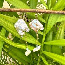 Charger l'image dans la galerie, Boho pearl earrings gold filled displayed outdoors with leafy green backdrop — keshi square pearls and blue gemstones by Loulia Pearl Jewelry