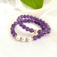 Charger l'image dans la galerie, Amethyst Pearl Bracelet pair on white cloth – one with three pearls and one without