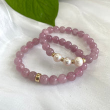 Load image into Gallery viewer, Rose Quartz Pearl Bracelet pair displayed on white cloth – two-bracelet close-up