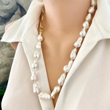 Charger l'image dans la galerie, White baroque pearl and gold chain necklace shown on mannequin, asymmetric handmade jewelry crafted in Canada.