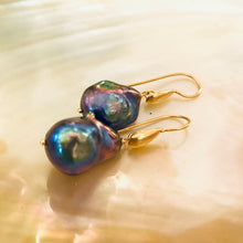 Charger l'image dans la galerie, Handmade black baroque pearl drop earrings with gold vermeil hooks displayed on white pearl backdrop