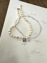 Charger l'image dans la galerie, White nugget pearl necklace with amethyst pendant design sketch and necklace laid out on paper.