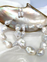 Charger l'image dans la galerie, Baroque Pearl Chunky Necklace featuring lustrous white freshwater pearls on a soft grey silk thread with matching earrings.