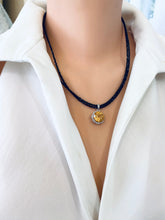 Charger l'image dans la galerie, Close-up side angle of black spinel and citrine pendant necklace with silver clasp