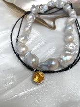 Charger l'image dans la galerie, Black spinel and citrine pendant necklace displayed beside baroque pearl necklace