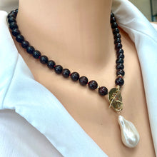 Load image into Gallery viewer, Garnet pearl necklace close up showing faceted garnet beads and white baroque pearl