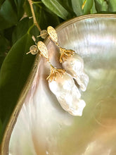 Charger l'image dans la galerie, Detailed view of Baroque Pearl Gold Vermeil Earrings surrounded by pearls and green leaves — timeless handcrafted jewelry by Loulia Pearl Jewelry