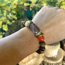 Load image into Gallery viewer, Amethyst baroque pearl bracelet worn on wrist, handmade in Canada with February birthstone amethyst