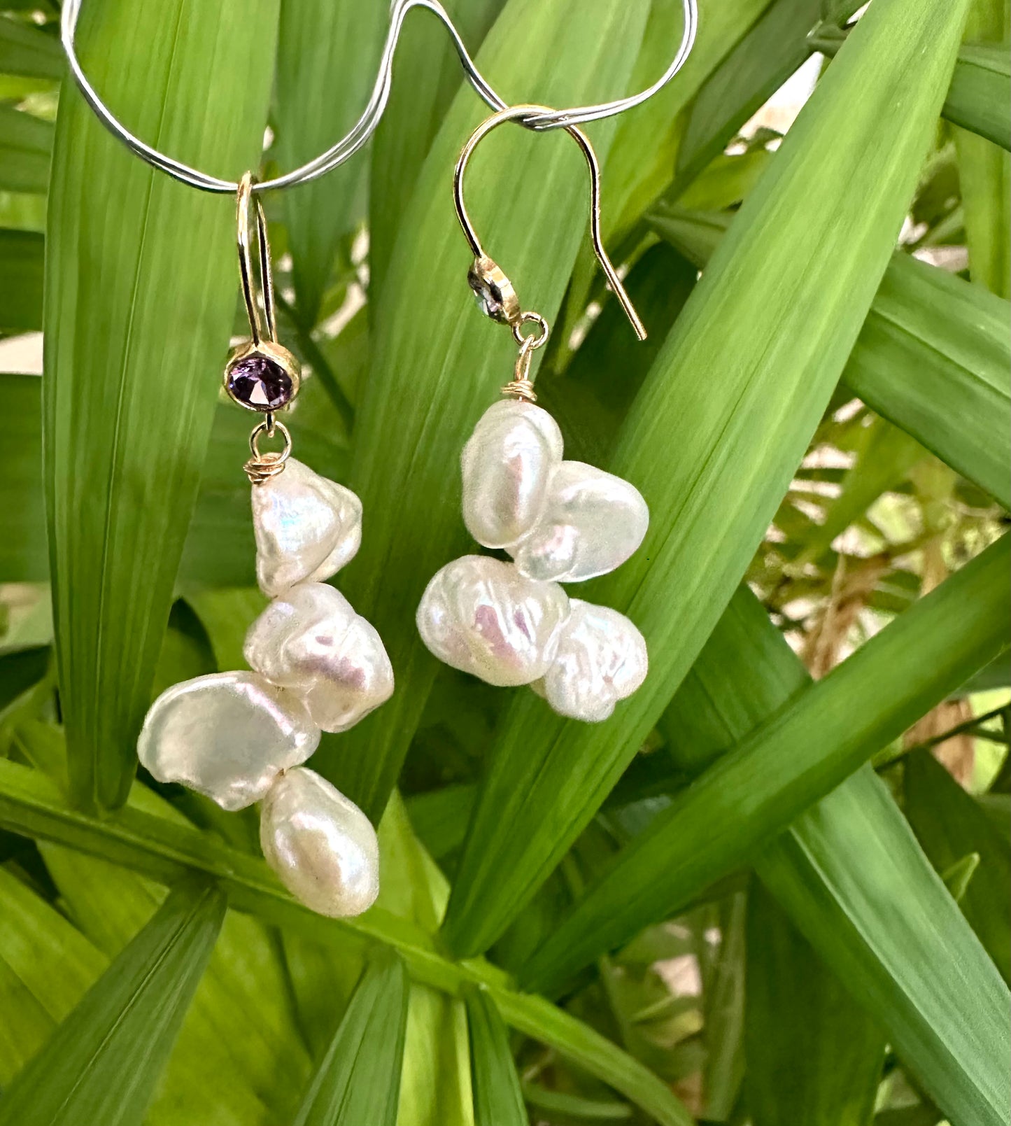 Keshi Pearl Drop Earrings featuring white keshi baroque pearls and purple CZ, handmade in Canada.