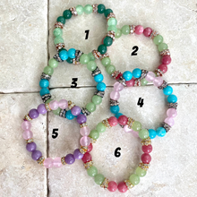 Load image into Gallery viewer, Colorful jade rhinestone stretchy bracelet variations displayed together for selection
