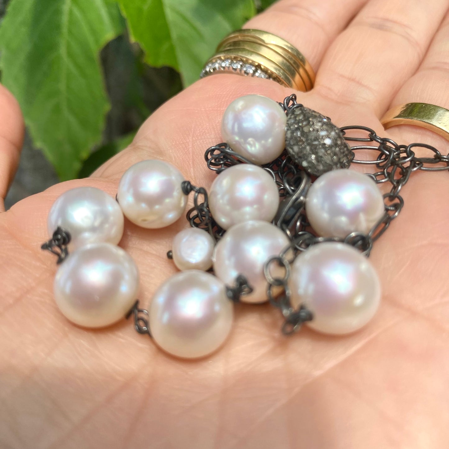 Handmade pearl necklace featuring high-lustre freshwater pearls and silver, showcasing classic elegance in Canada.