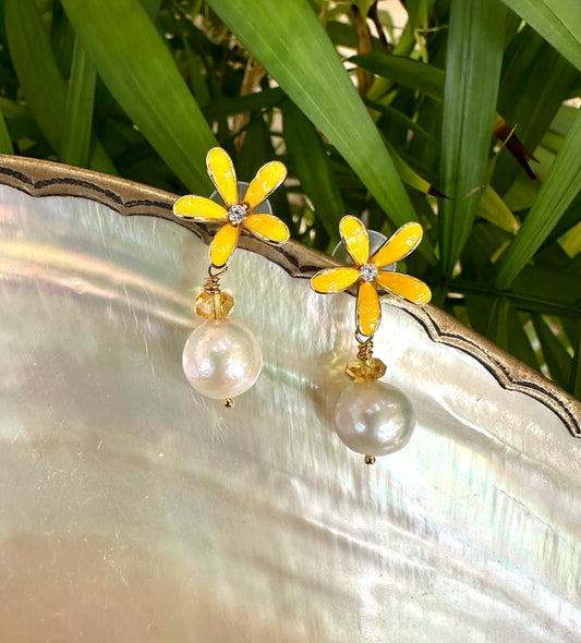 Edison pearl citrine earrings with white Edison pearls, yellow enamel flower studs, and gold details
