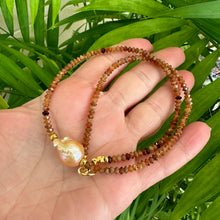 Load image into Gallery viewer, Hessonite garnet baroque pearl necklace featuring warm colors and unique golden pink pearl design.
