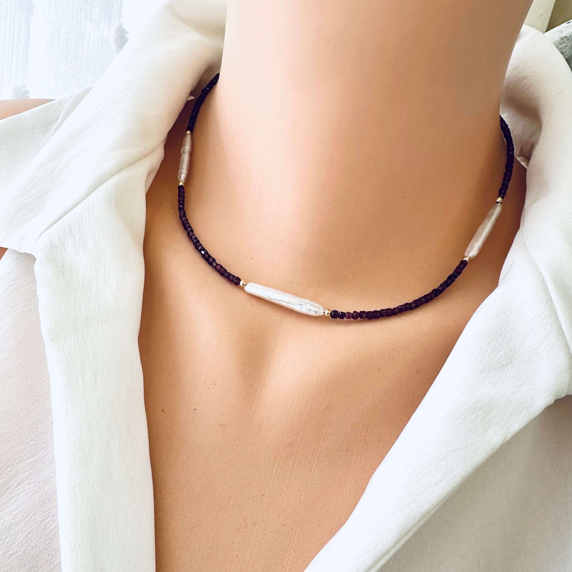 Garnet Pearl Necklace worn on mannequin – close-up front view – handmade in Canada