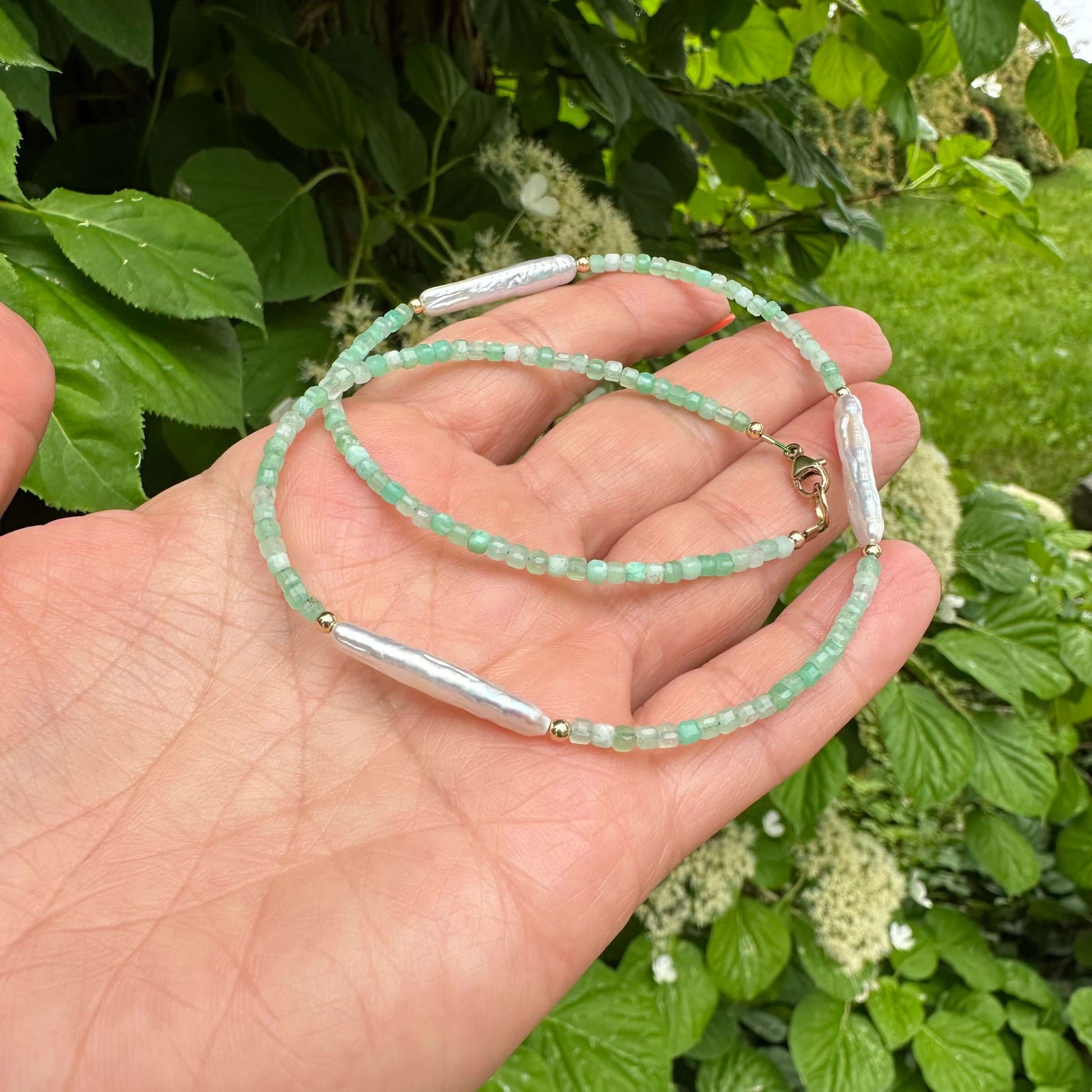 Close-up of Green Chrysoprase Necklace beads and Baroque pearls – natural light