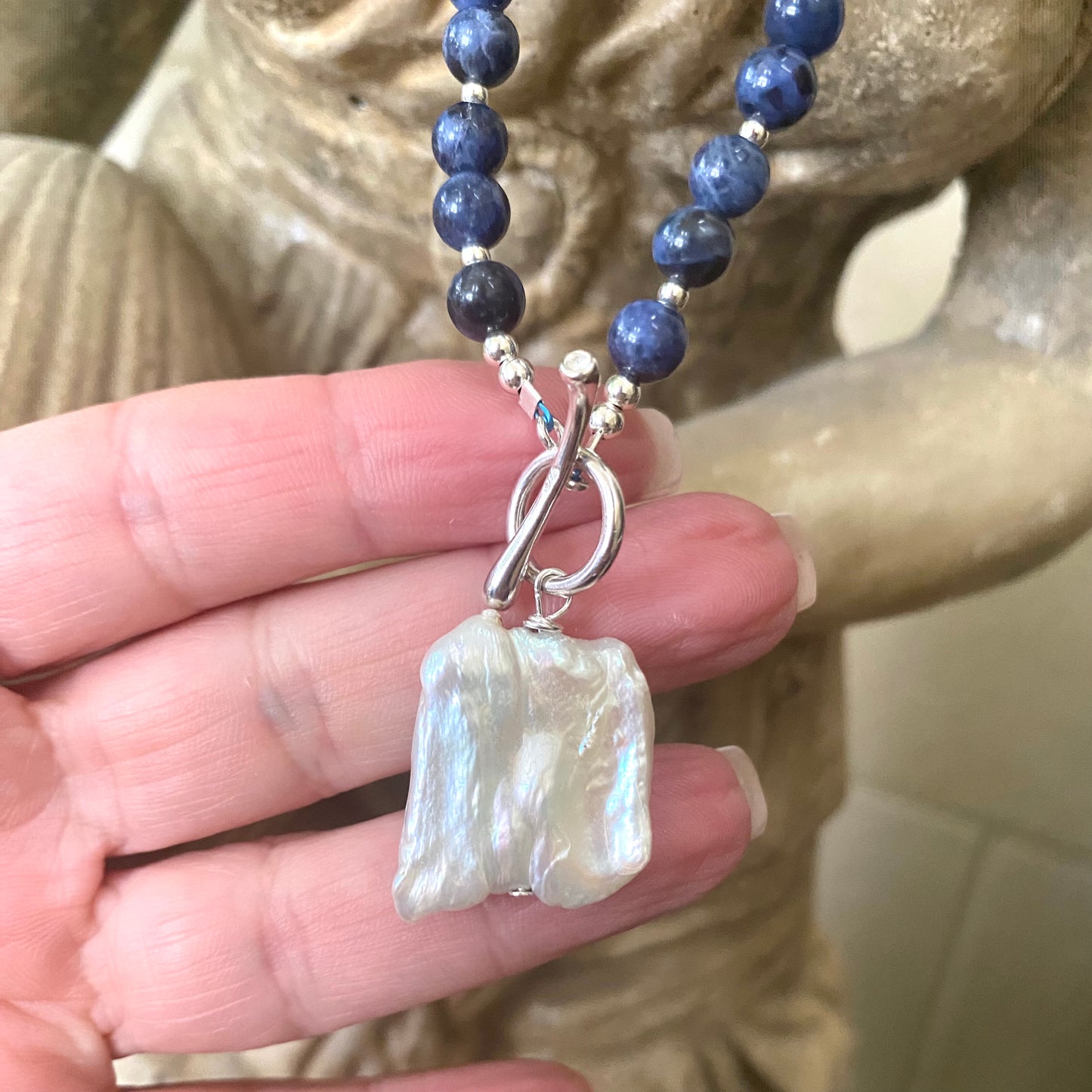 Sodalite pearl necklace with keshi pearl pendant close-up