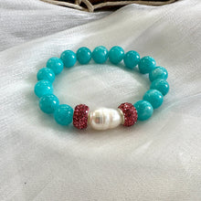 Load image into Gallery viewer, Teal jade bracelet featuring natural 10mm jade beads, freshwater pearl, and pink rhinestone accents.
