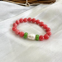 Load image into Gallery viewer, Red jade bracelet with pearl and green rhinestones displayed on white cloth

