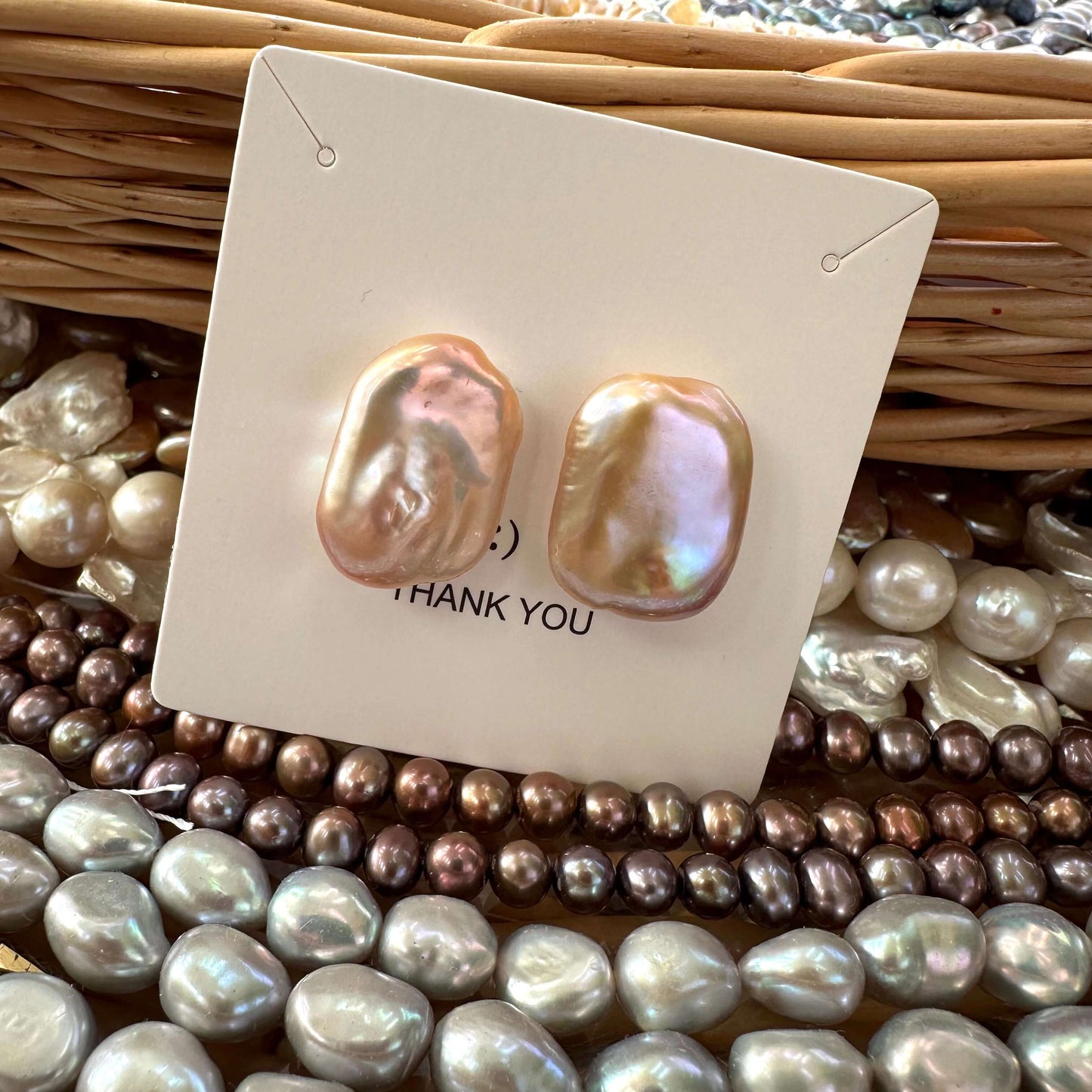 Golden pink rectangle baroque pearl stud earrings packaged with gemstones, luxury handcrafted jewelry designed in Canada.