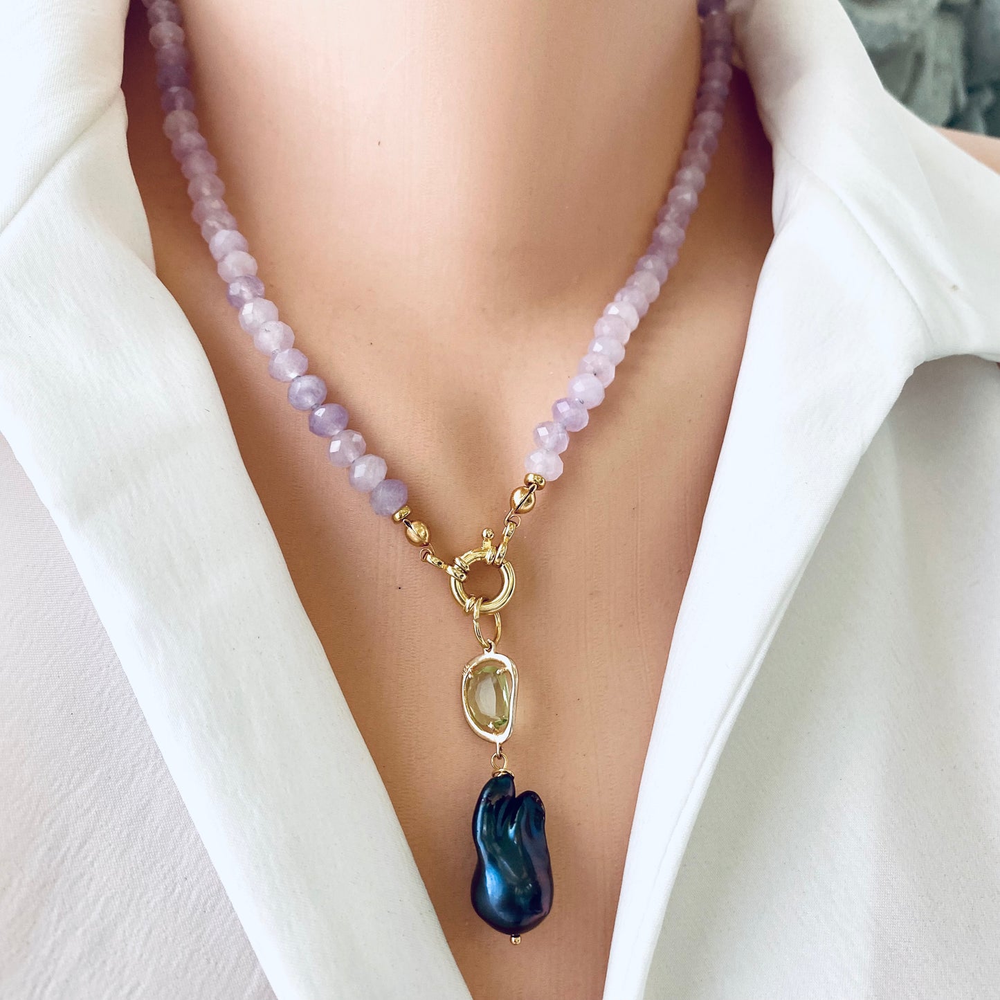 Lavender amethyst baroque pearl necklace featuring light-purple Amethyst beads and a stunning Baroque pearl pendant.
