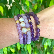 Charger l&#39;image dans la galerie, Amethyst Pearl Bracelet paired with mixed gemstone bracelets on wrist – lifestyle close-up
