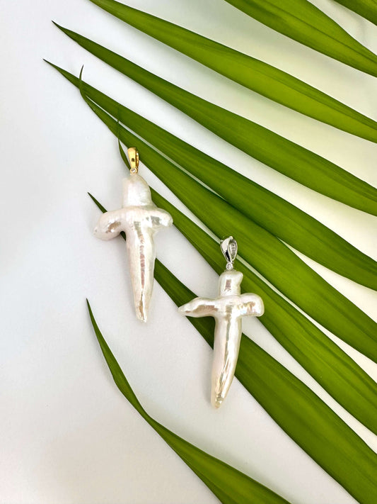 Baroque pearl cross pendant in rhodium-plated sterling silver, elegant handmade design.