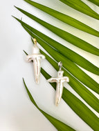 Baroque pearl cross pendant in rhodium-plated sterling silver, elegant handmade design.