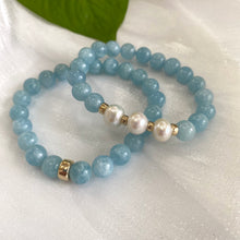 Load image into Gallery viewer, Aquamarine pearl bracelet featuring 8mm aquamarine beads and 9-10mm freshwater pearls with 14K gold filled accents.
