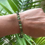 Chrysoprase Stretch Bracelet – 6mm Beads in 14K Gold Filled worn on wrist with green tones and natural design