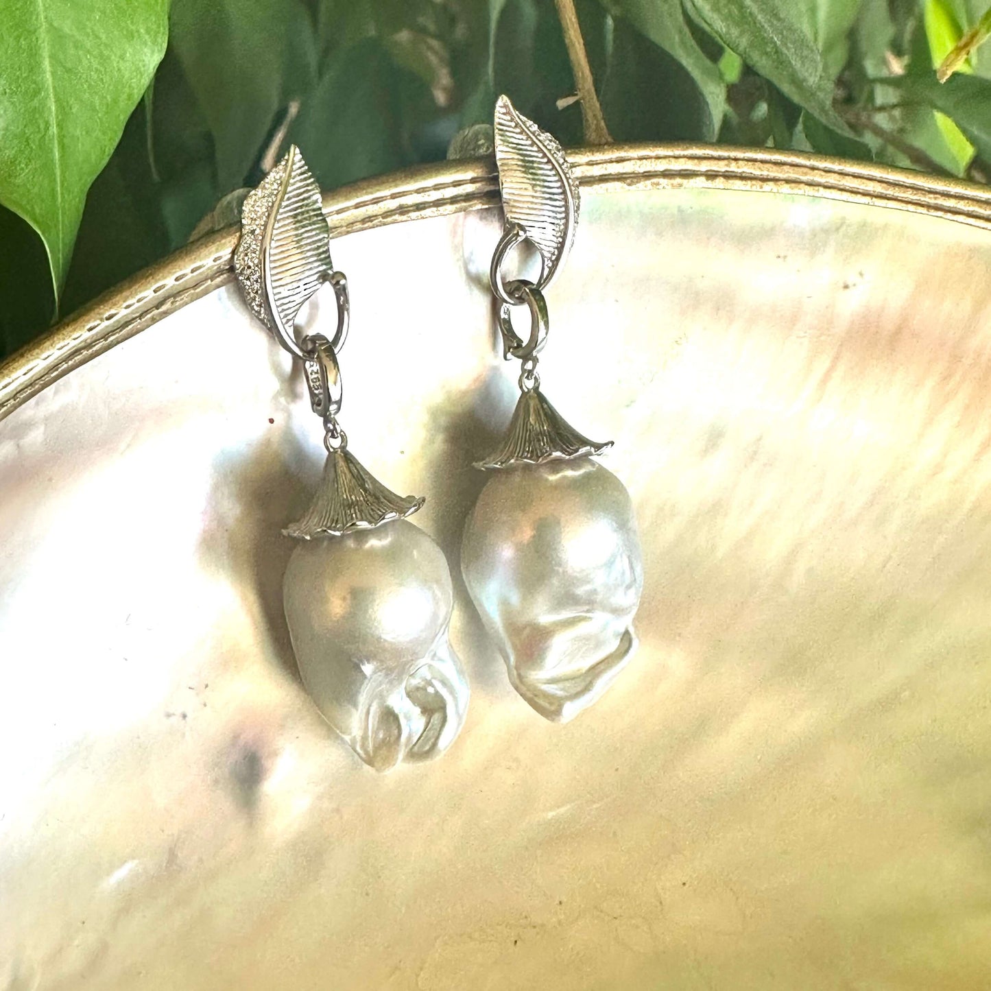 Handcrafted Leaf Design Baroque Pearl Earrings on natural green backdrop — elegant sterling silver and baroque pearl design by Loulia Pearl Jewelry