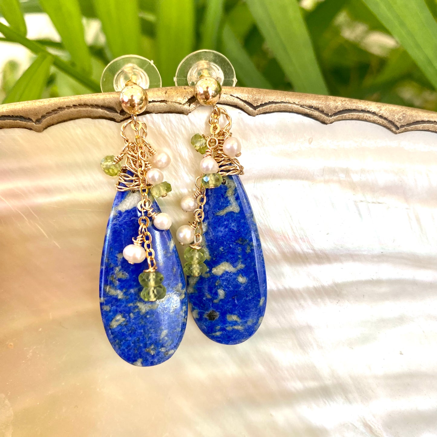 Lapis Lazuli Peridot Earrings featuring teardrop lapis lazuli stones and delicate gold-filled accents.