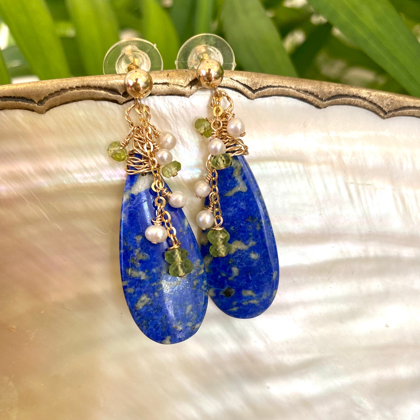Lapis Lazuli Peridot Earrings with teardrop lapis lazuli stones and delicate pearl accents.