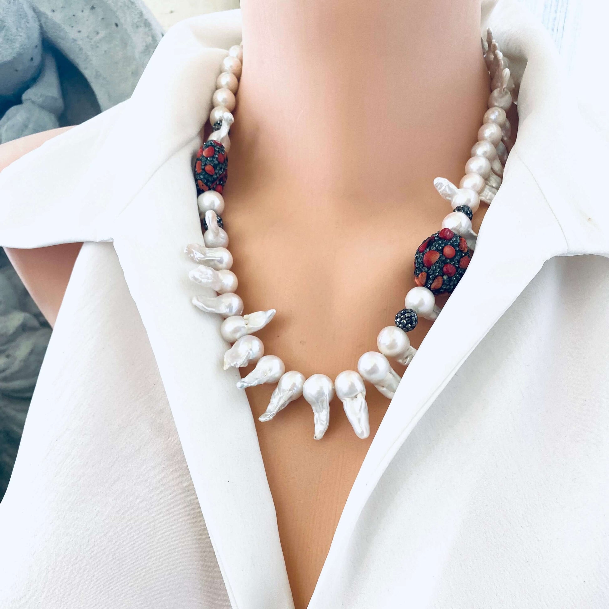Baroque pearl jellyfish necklace red coral side view on mannequin handmade in Canada