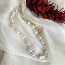 Load image into Gallery viewer, Detailed product shot of baroque pearl gold chain necklace — freshwater baroque pearls and gold vermeil chain displayed on white background
