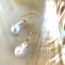 Charger l&#39;image dans la galerie, Side angle of white baroque pearl drop earrings showing organic shape and iridescence – handmade in Canada
