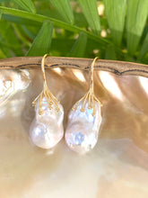 Charger l&#39;image dans la galerie, Handmade white baroque pearl drop earrings on natural shell and leaf background – gold vermeil hooks
