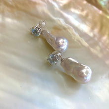 Charger l&#39;image dans la galerie, Baroque pearl drop earrings with blue topaz studs on white shell backdrop
