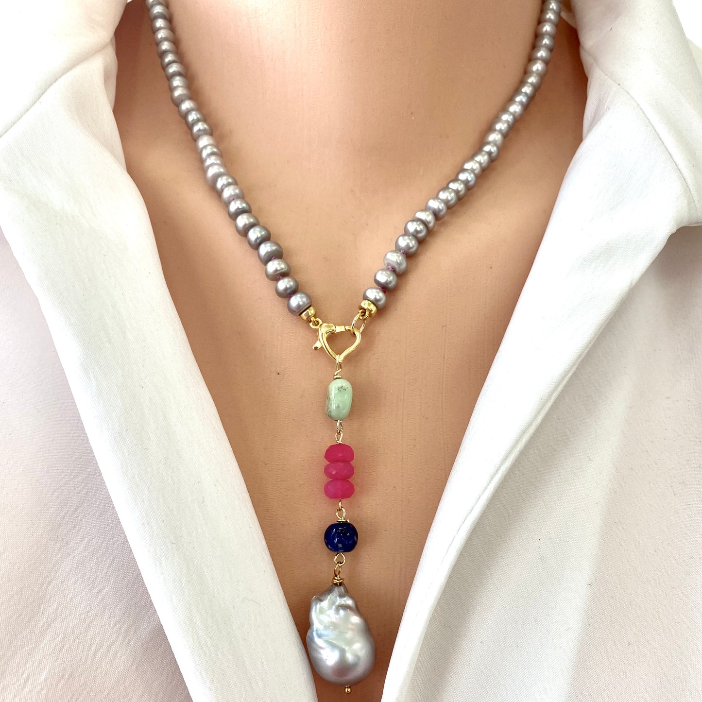 Grey pearl necklace with removable pendant showing silver gray pearls and heart clasp