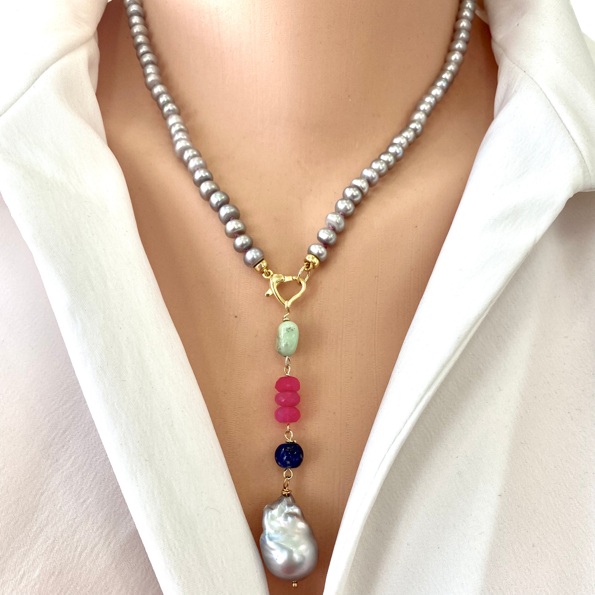 Grey pearl necklace with removable pendant showing silver gray pearls and heart clasp