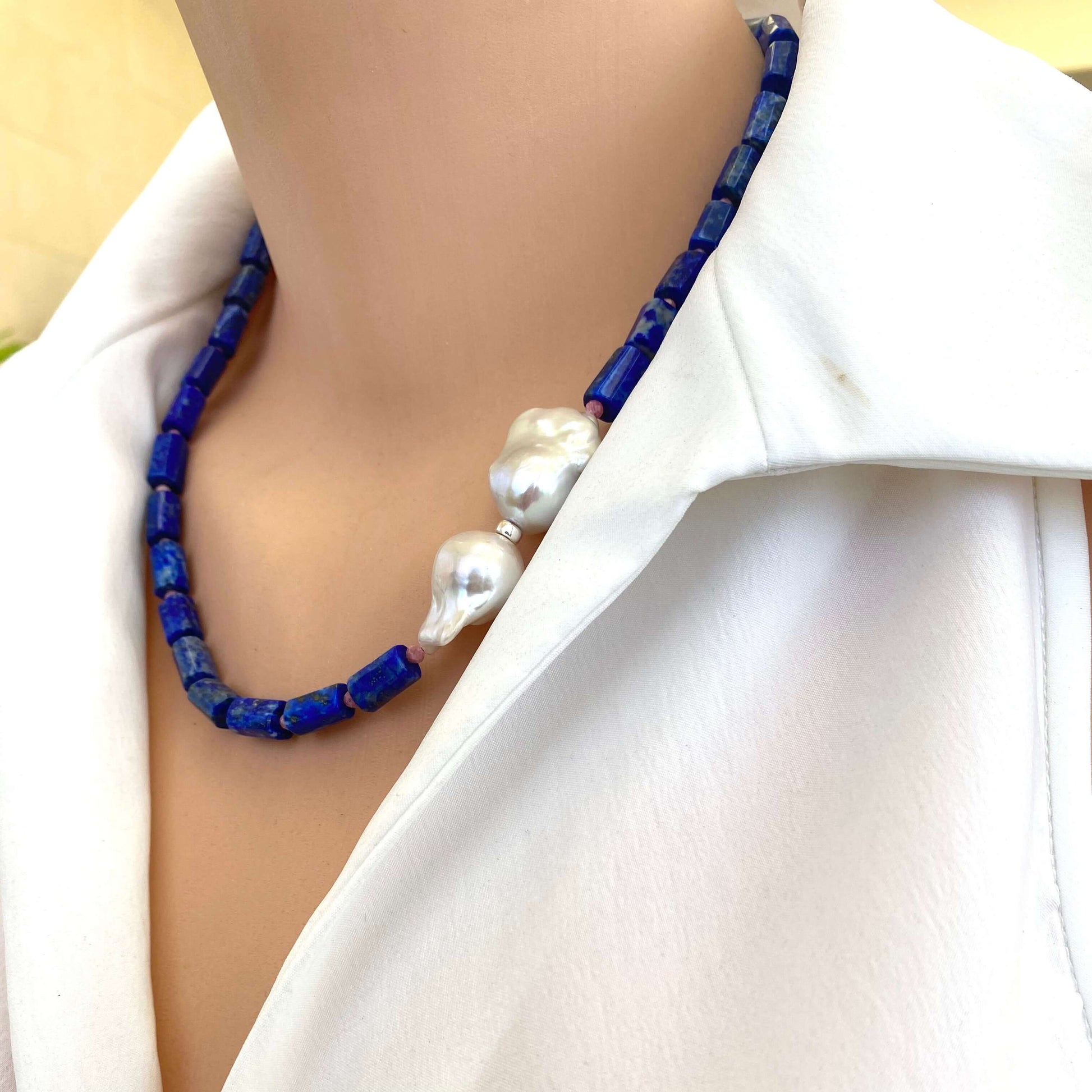 Angled view of Lapis Lazuli Pink Rhodonite Baroque Pearl Necklace on mannequin — handcrafted gemstone and pearl necklace by Loulia Pearl Jewelry