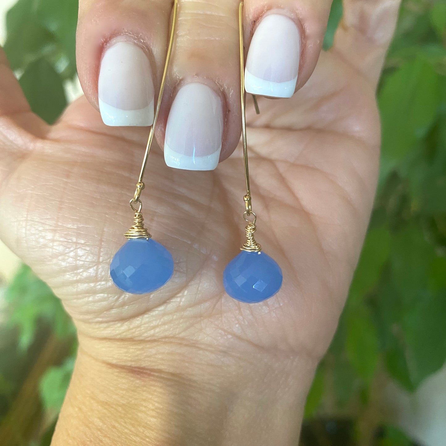 Chalcedony threader earrings with blue briolettes showcasing elegant design and refined craftsmanship.