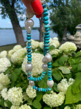 Load image into Gallery viewer, Arizona turquoise pearl necklace featuring turquoise rondelle beads and pearls set against lush greenery.
