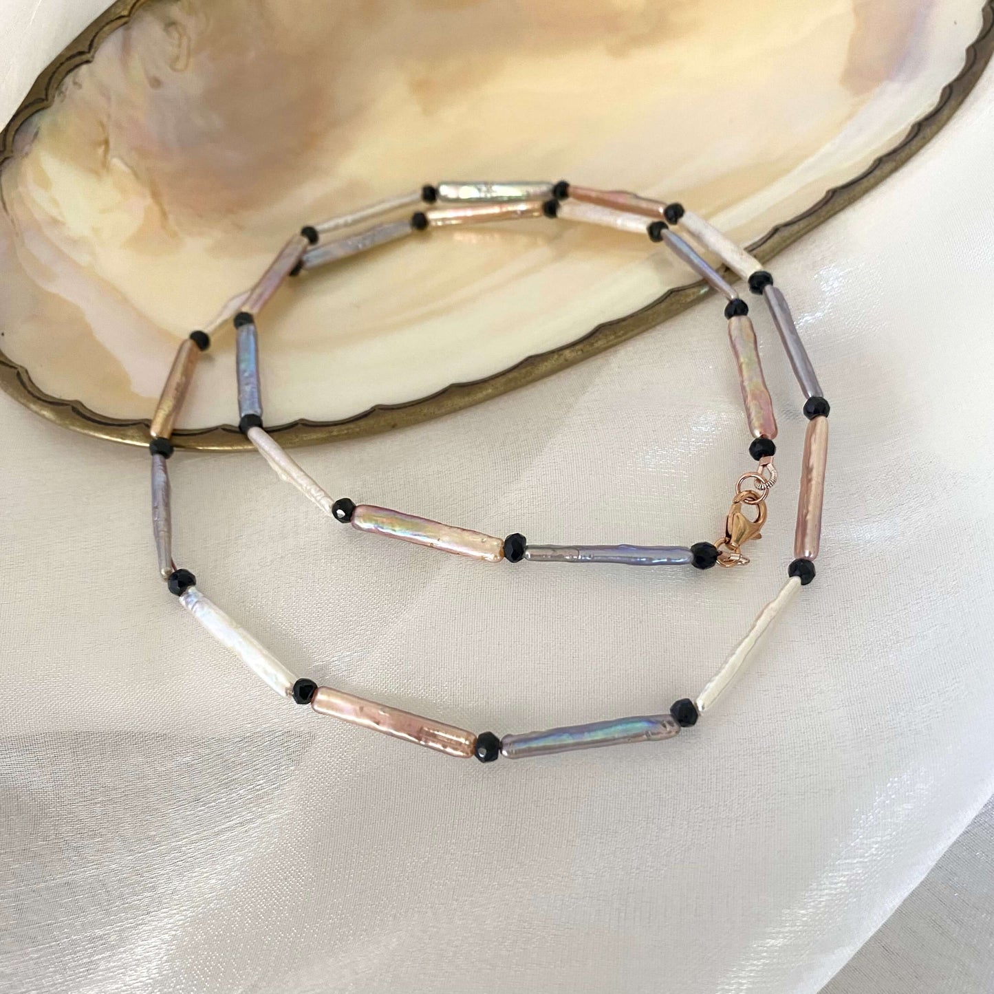 Pastel Stick Pearl Necklace featuring stick pearls in pastel colors with black spinel accents, handcrafted design.