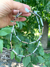 Load image into Gallery viewer, Pastel Stick Pearl Necklace featuring stick pearls in white, blush pink, and soft grey with black spinel accents.
